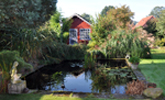 Teich mit Hütte